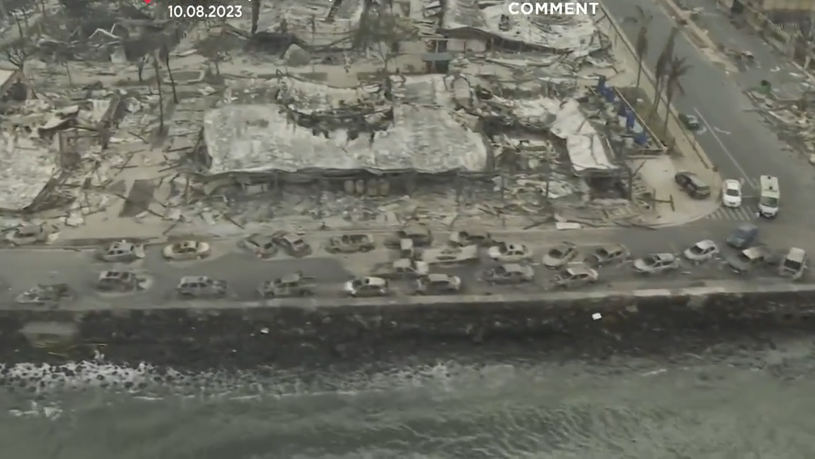 Helicopter footage shows parts of Maui reduced to gray and black rubble after wildfires